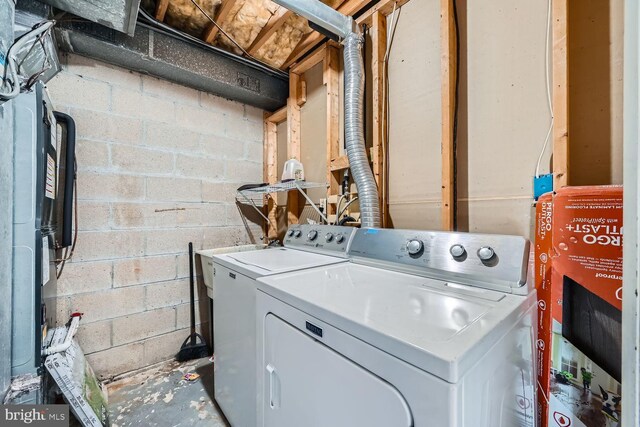 washroom featuring washer and dryer