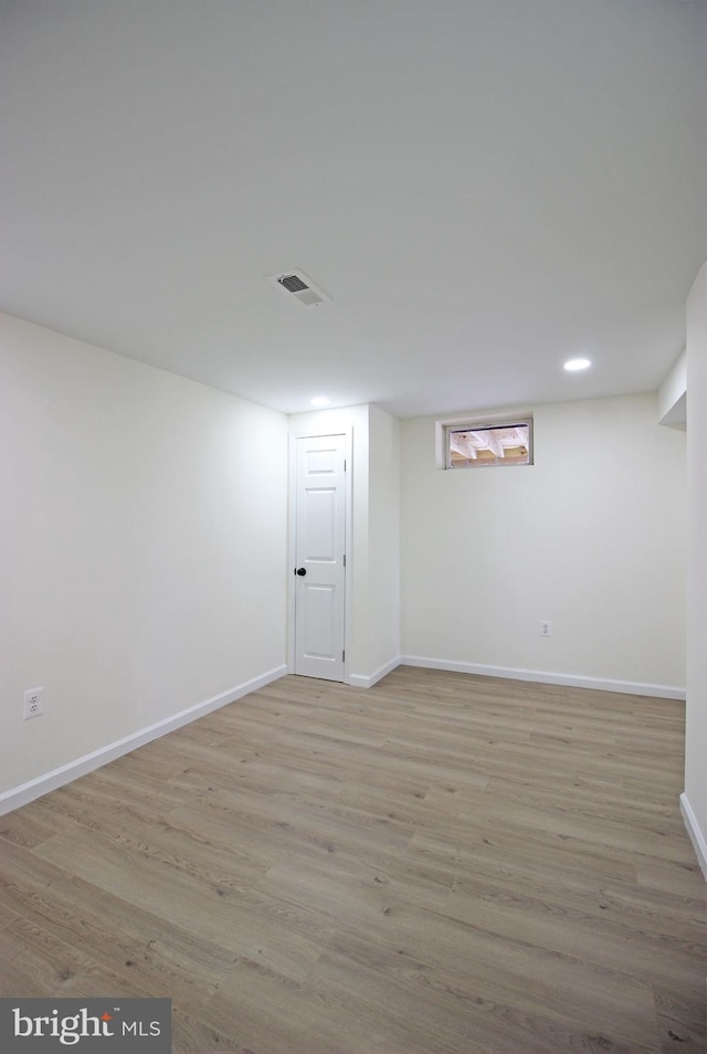 basement with light wood-type flooring