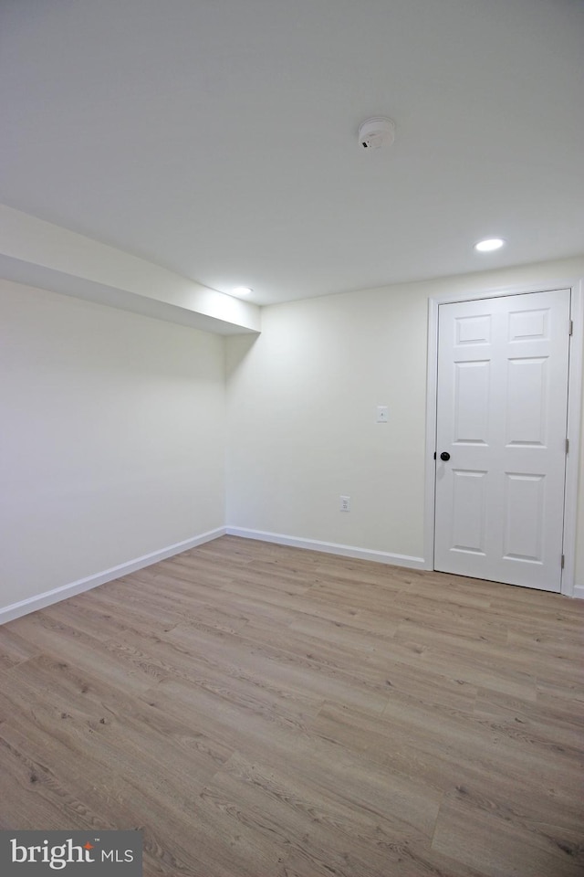 basement with light wood-type flooring