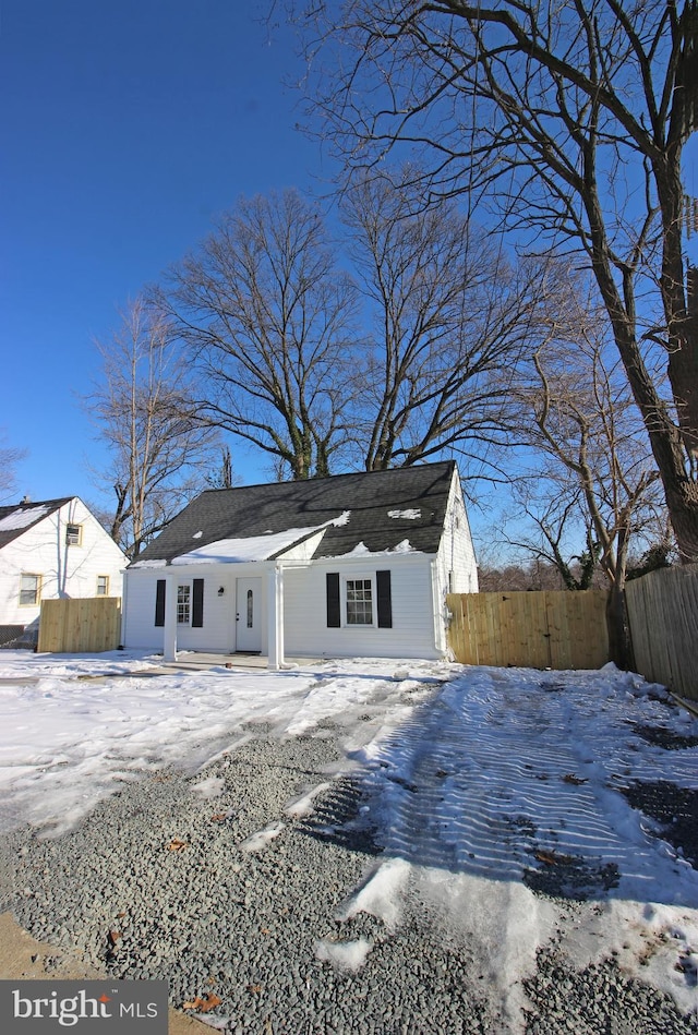 view of snow covered house