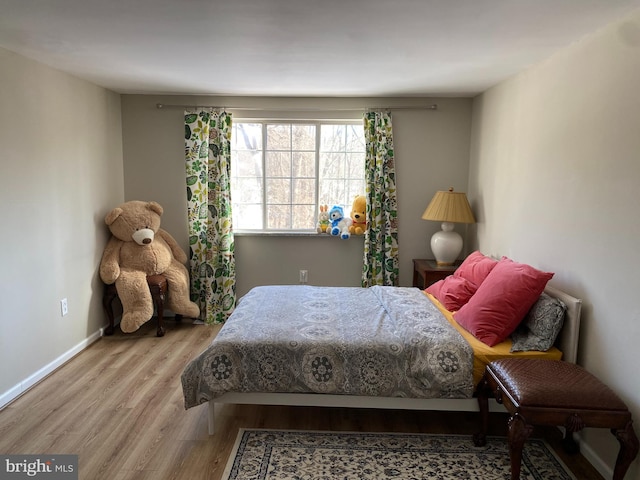 bedroom with light hardwood / wood-style flooring