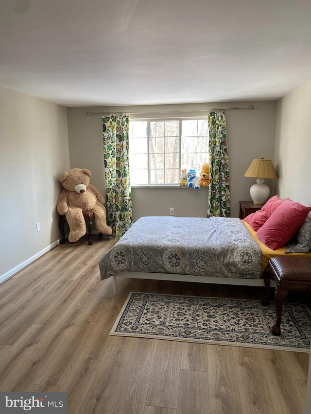 bedroom featuring light hardwood / wood-style floors