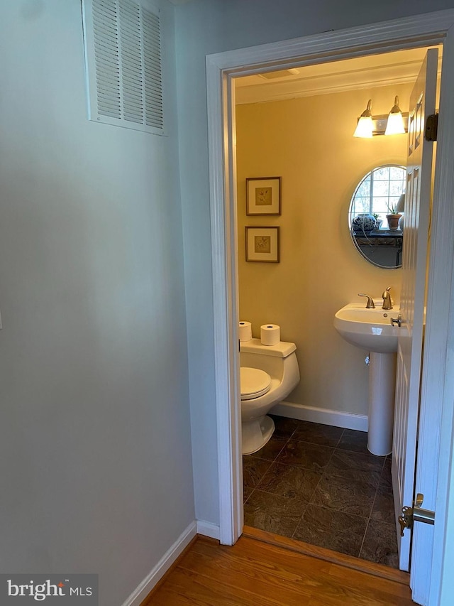 bathroom featuring toilet