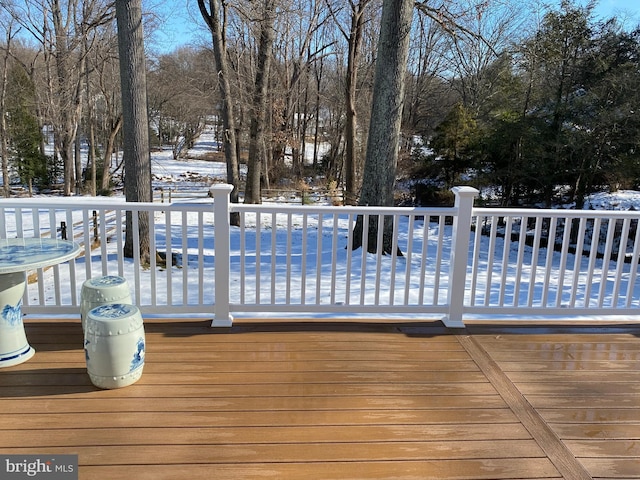 view of snow covered deck