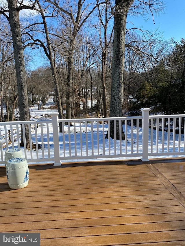 view of snow covered deck