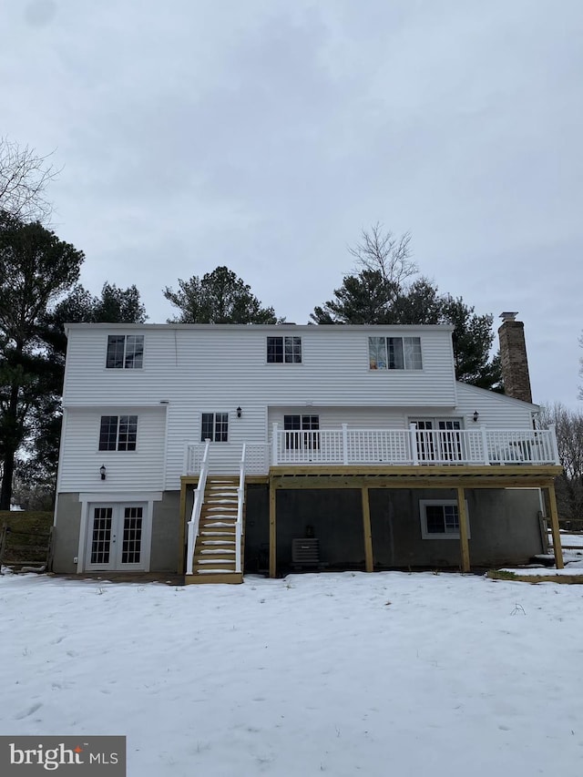 view of front of property with a deck