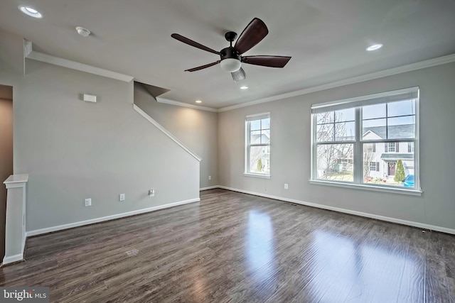 unfurnished living room featuring ceiling fan, dark hardwood / wood-style flooring, and ornamental molding