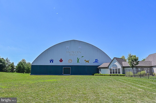 exterior space featuring a front lawn