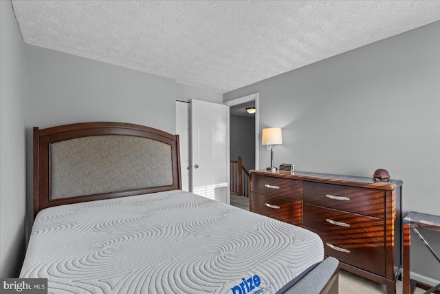 bedroom with a textured ceiling