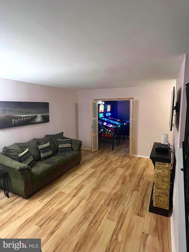 living room with light hardwood / wood-style floors