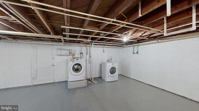 laundry room featuring washing machine and dryer