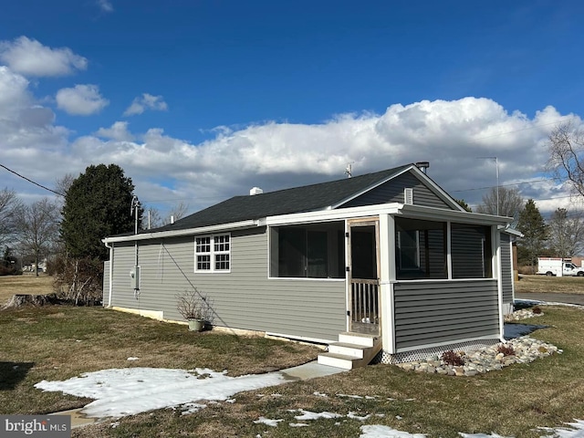 view of front of home with a front yard