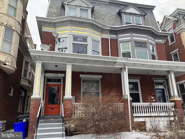 view of front of home featuring covered porch