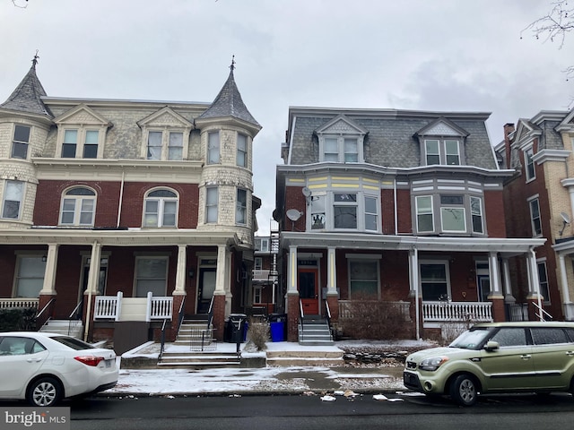 view of front of home featuring covered porch