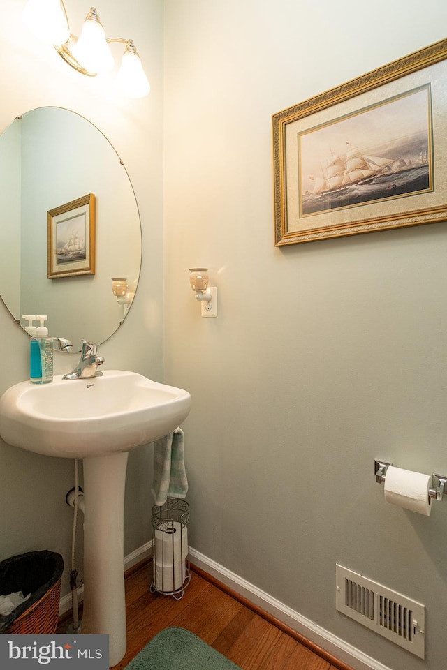 bathroom featuring hardwood / wood-style floors and sink