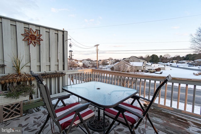 view of snow covered deck