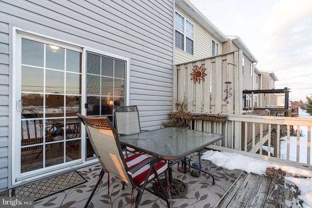 view of snow covered deck