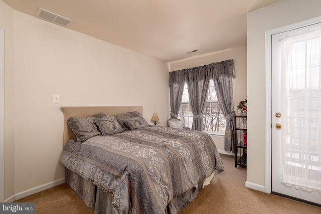 bedroom featuring light carpet