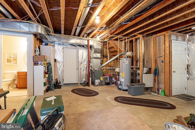 basement with heating unit and water heater