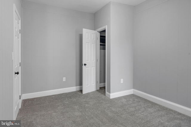 unfurnished bedroom with carpet flooring