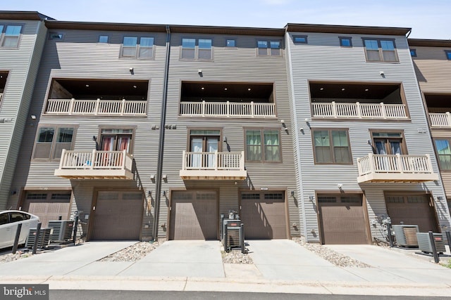 14079 Sunrise Valley Dr Unit 15P, Herndon, VA 20171 - view of property with an attached garage and driveway