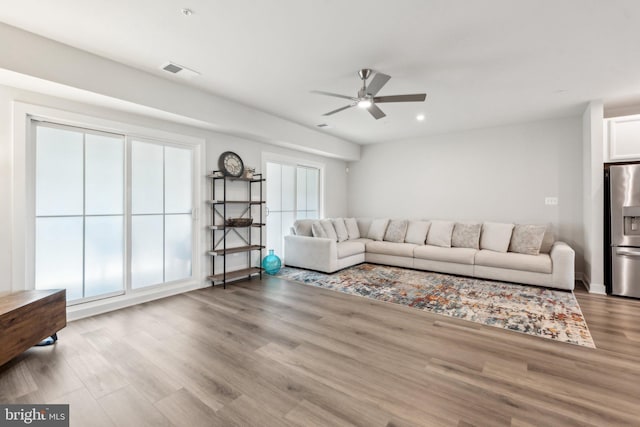 14079 Sunrise Valley Dr Unit 15P, Herndon, VA 20171 - living room featuring ceiling fan, wood finished floors, and recessed lighting
