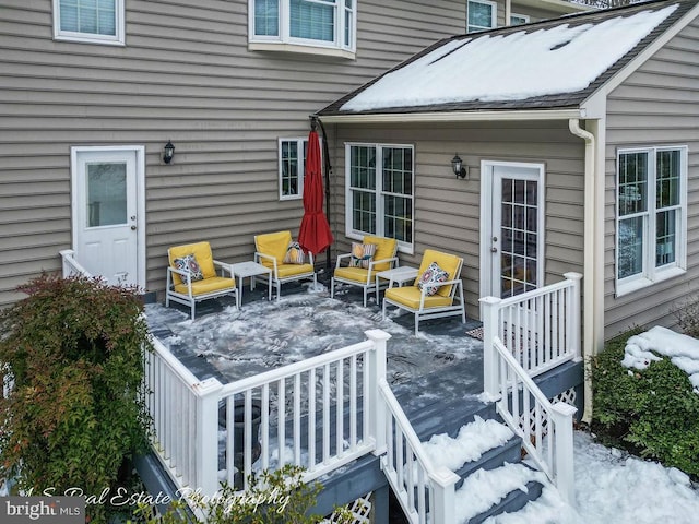 view of snow covered deck