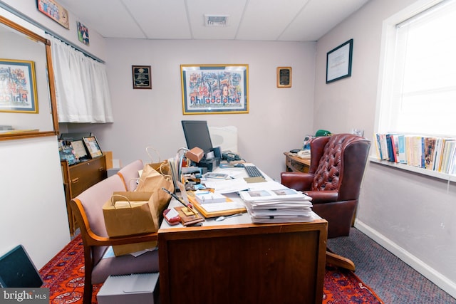 home office with a drop ceiling