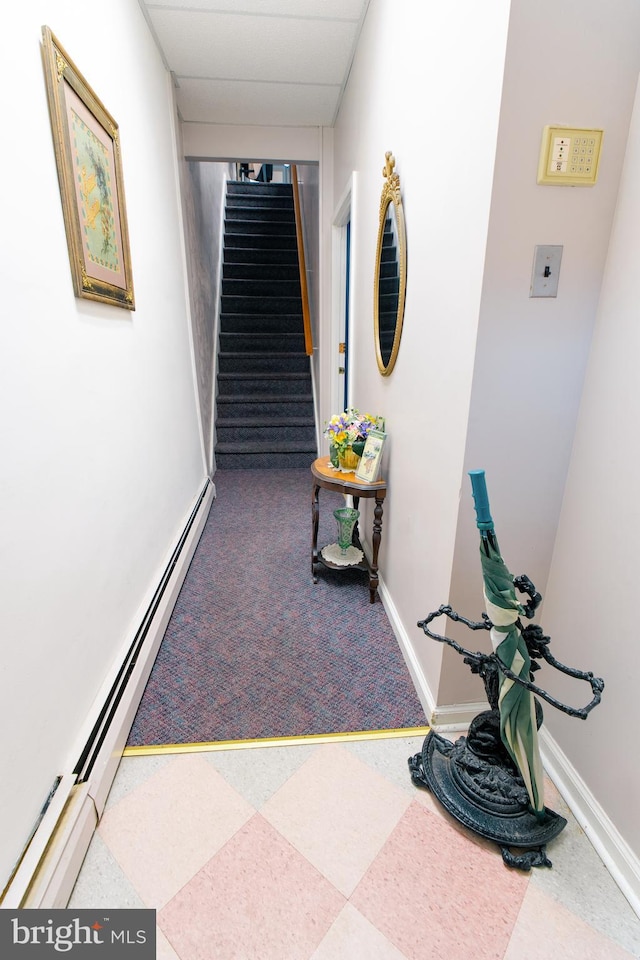 hallway featuring baseboard heating