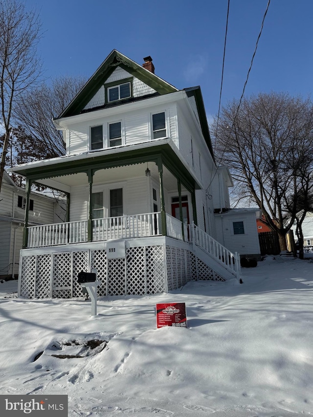 view of front of home featuring covered porch