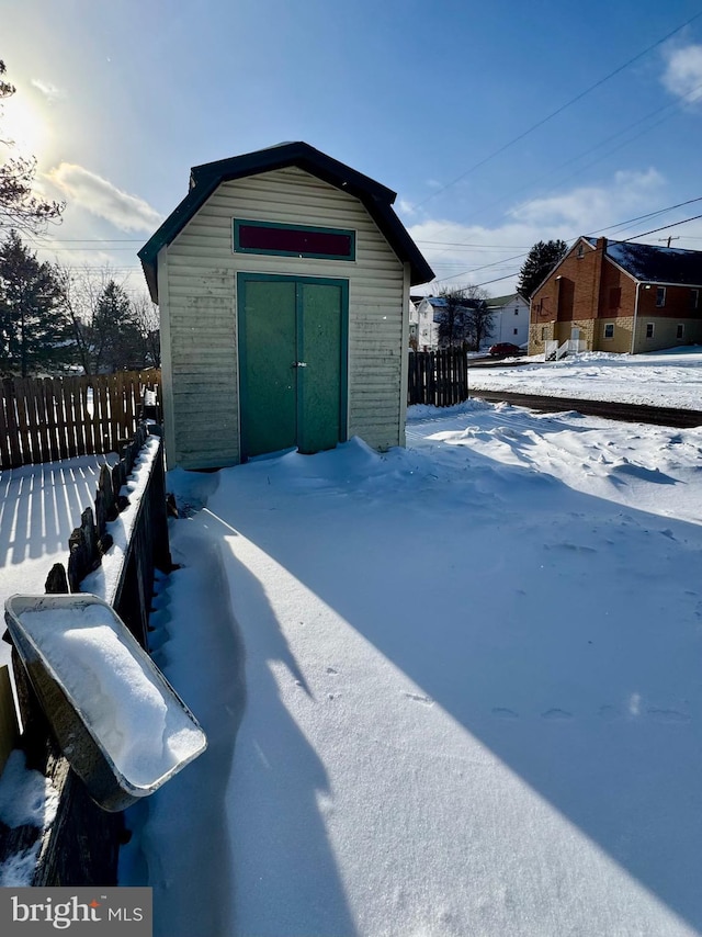 view of snow covered garage