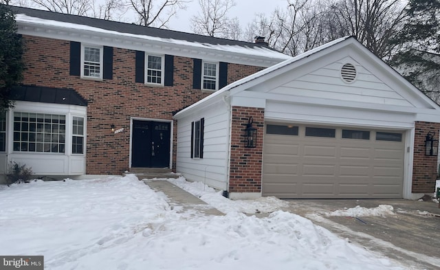 view of front of property with a garage