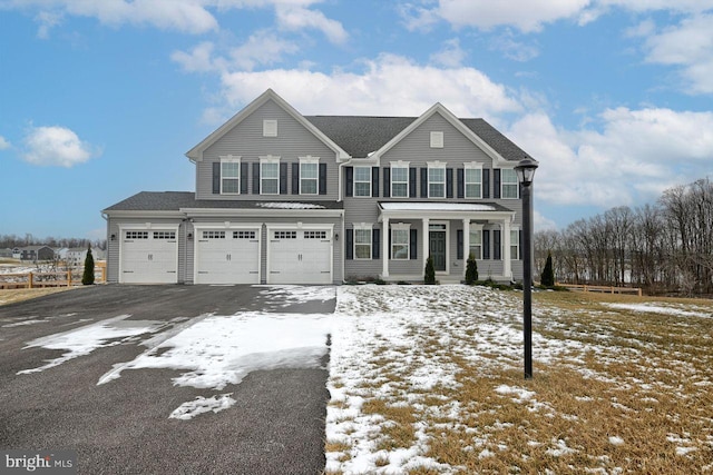 view of front of home with a garage