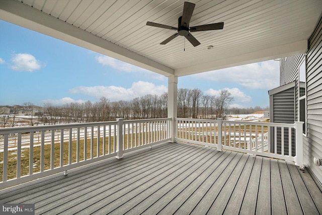 wooden terrace with ceiling fan