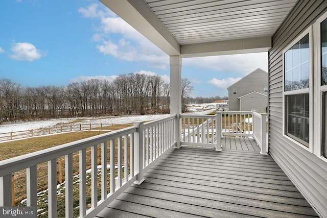 view of snow covered deck