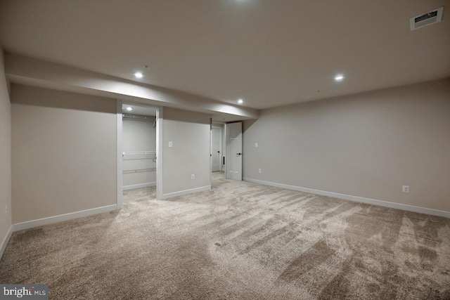 basement with light carpet