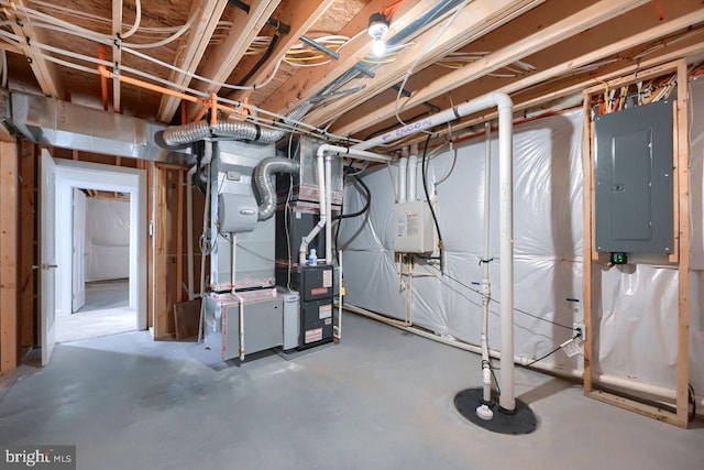 basement featuring electric panel and heating unit