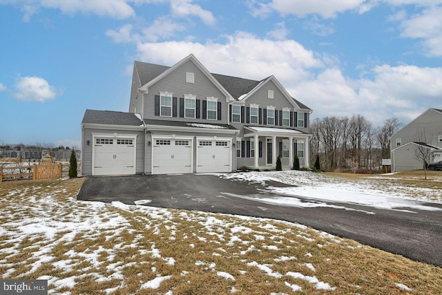 front of property with a garage