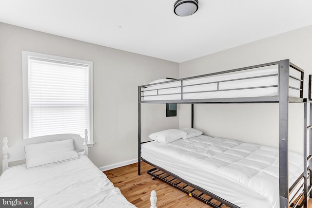 bedroom featuring hardwood / wood-style floors