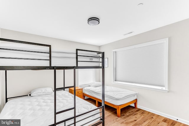 bedroom featuring light hardwood / wood-style floors