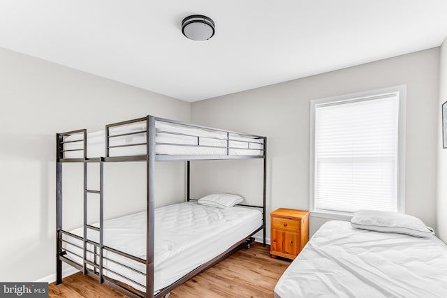 bedroom with light hardwood / wood-style flooring