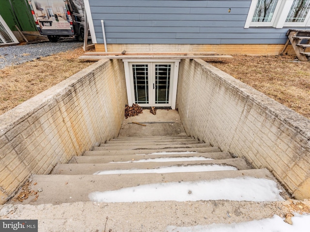 view of exterior entry featuring french doors