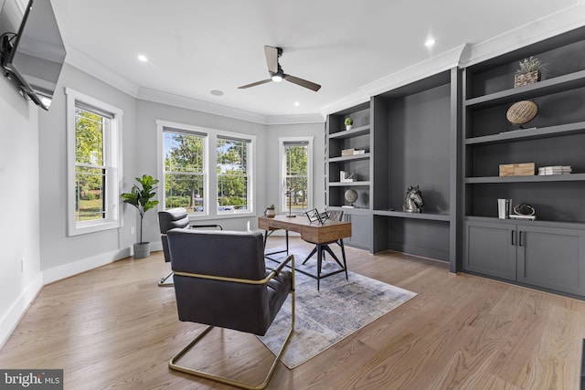 office with ceiling fan, ornamental molding, built in features, and light hardwood / wood-style flooring