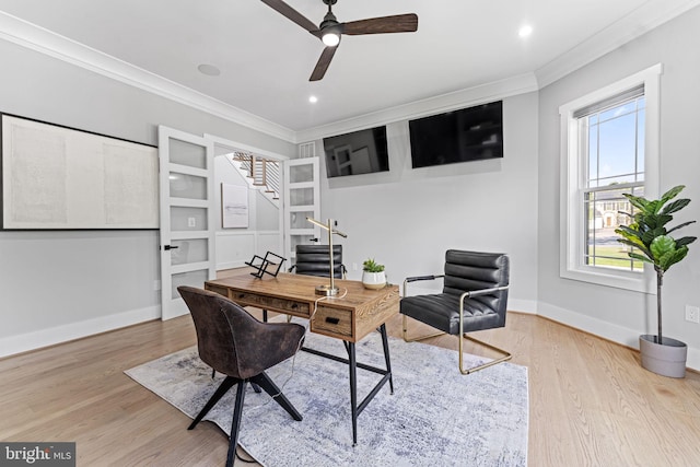 office with crown molding, hardwood / wood-style flooring, and ceiling fan