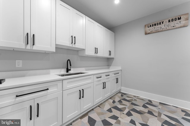 laundry room with sink