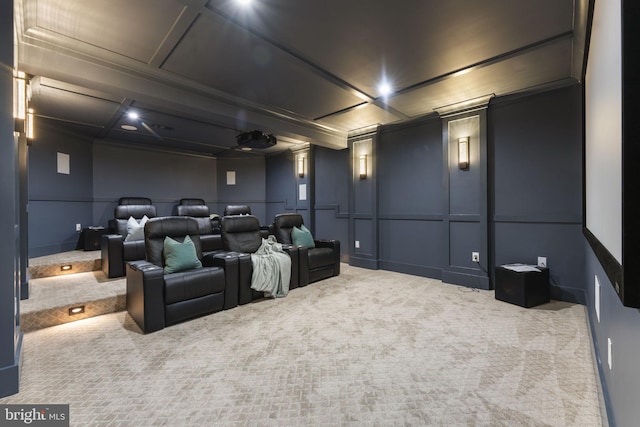 cinema room featuring carpet flooring