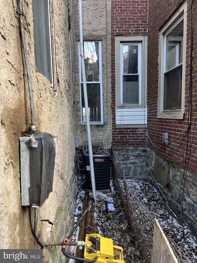 view of property exterior with central air condition unit