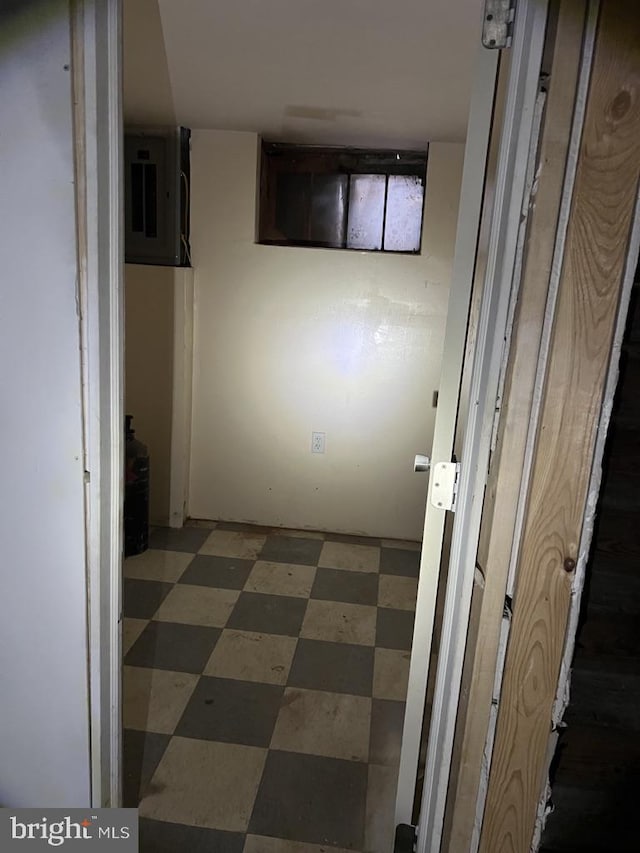 hallway with electric panel