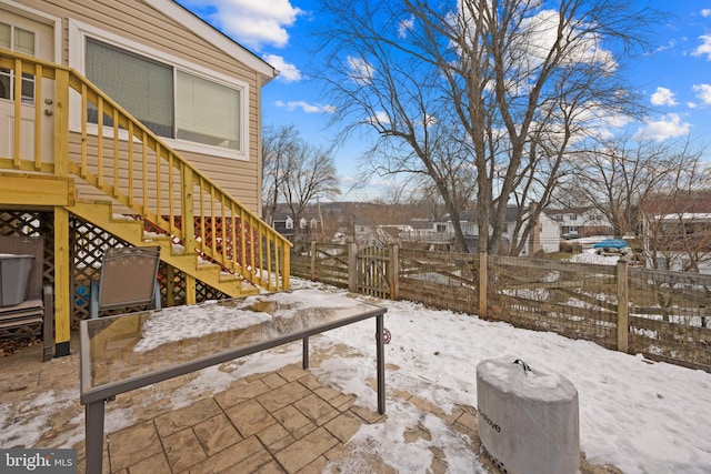 view of snow covered patio