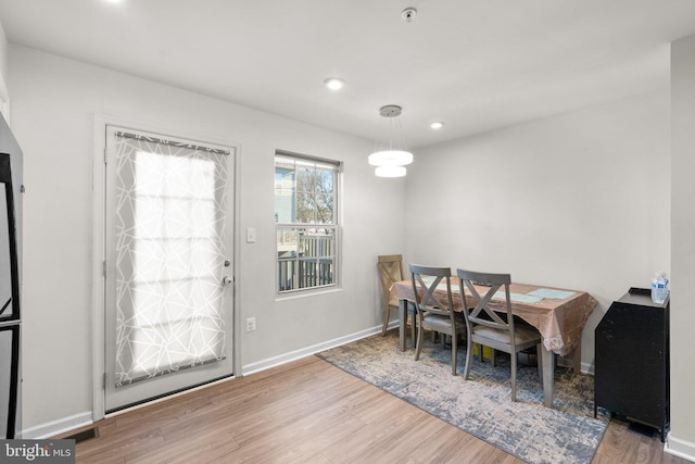 dining area featuring hardwood / wood-style flooring